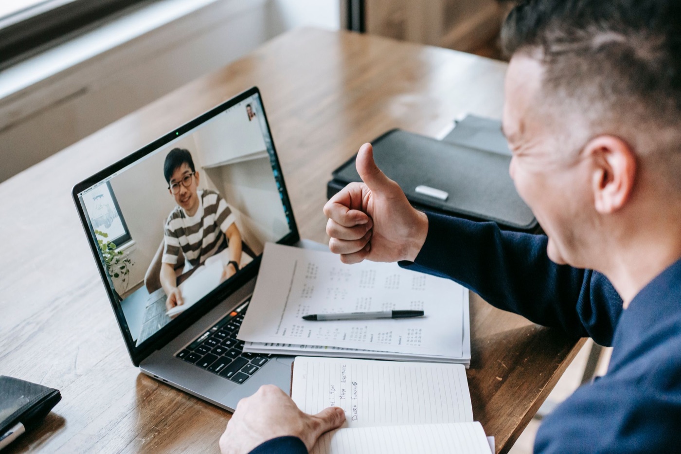 Independent college counselor meeting virtually with a student.