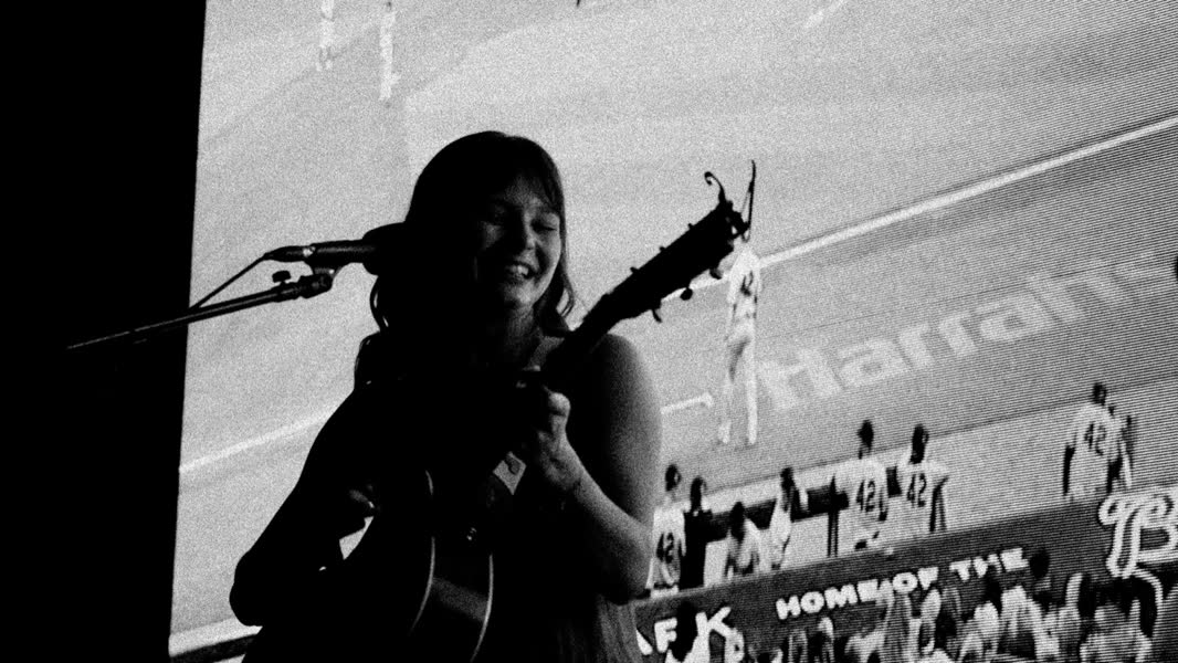 A student performing with her ensemble.